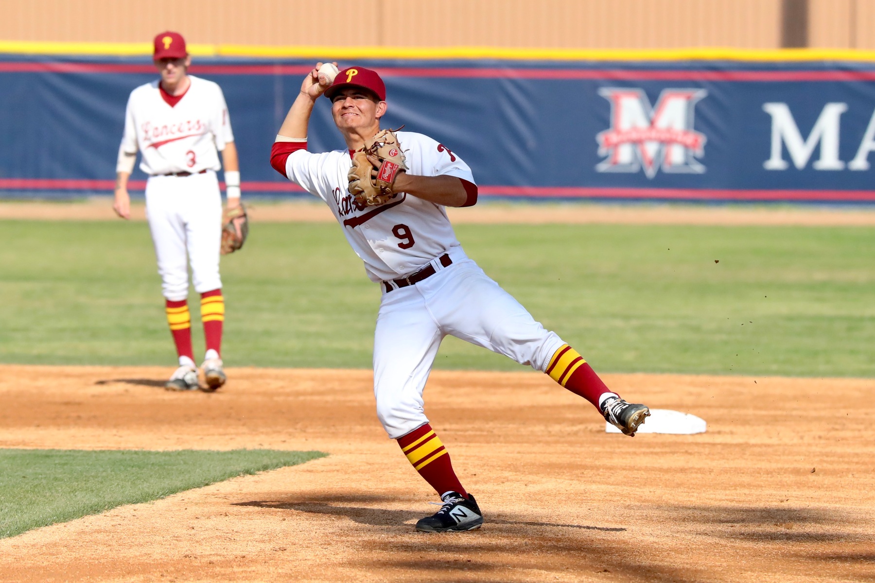 Moises Nolasco Sanchez makes the throw to first during PCC's South Coast Conference-opening win on Tuesday, photo by Michael Watkins.