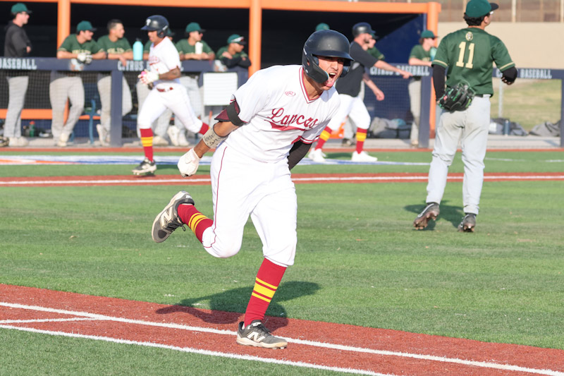 Adrian Roman is excited a moment after his game-winning hit on Saturday (photo by Richard Quinton).