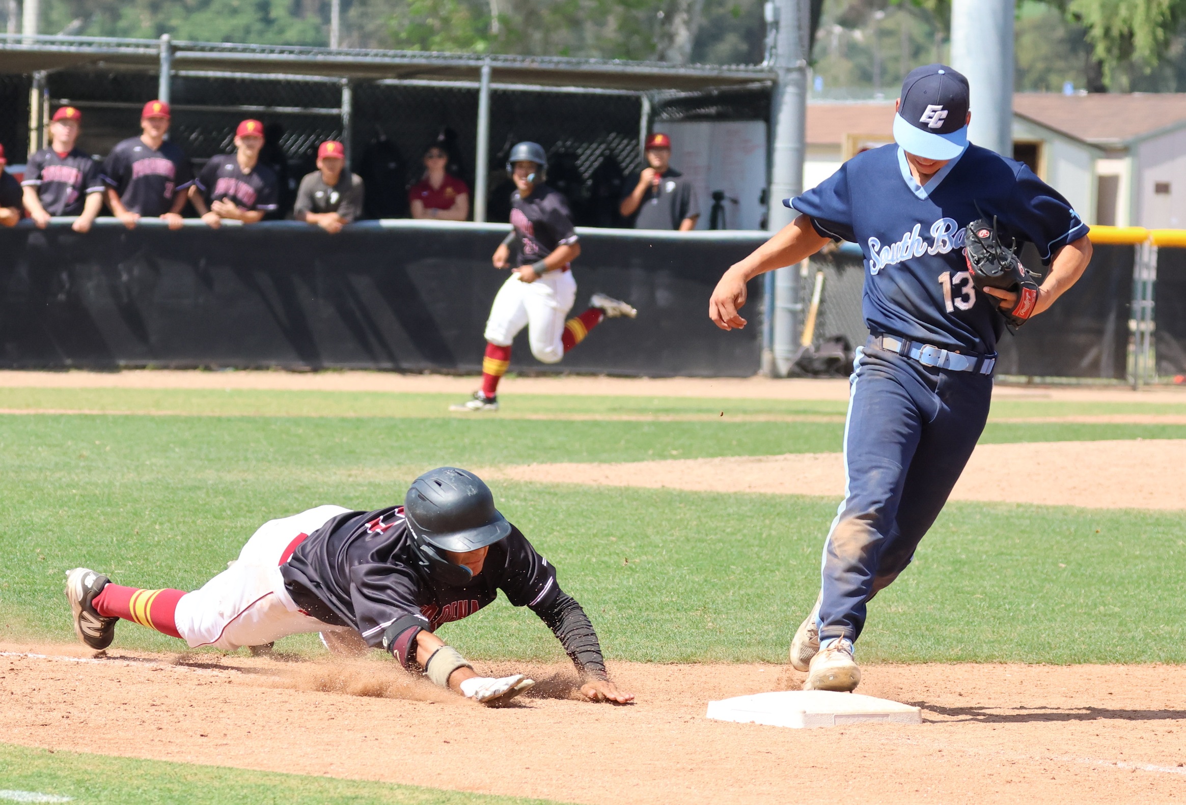 Adrian Roman makes a last-ditch effort but is beat to the bag for the game's final out on Saturday (photo by Richard Quinton).