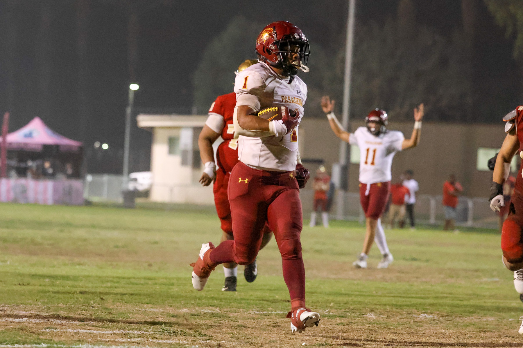 Issac Glover with his second TD run during PCC's rout at College of the Desert on Saturday (photo by Richard Quinton).