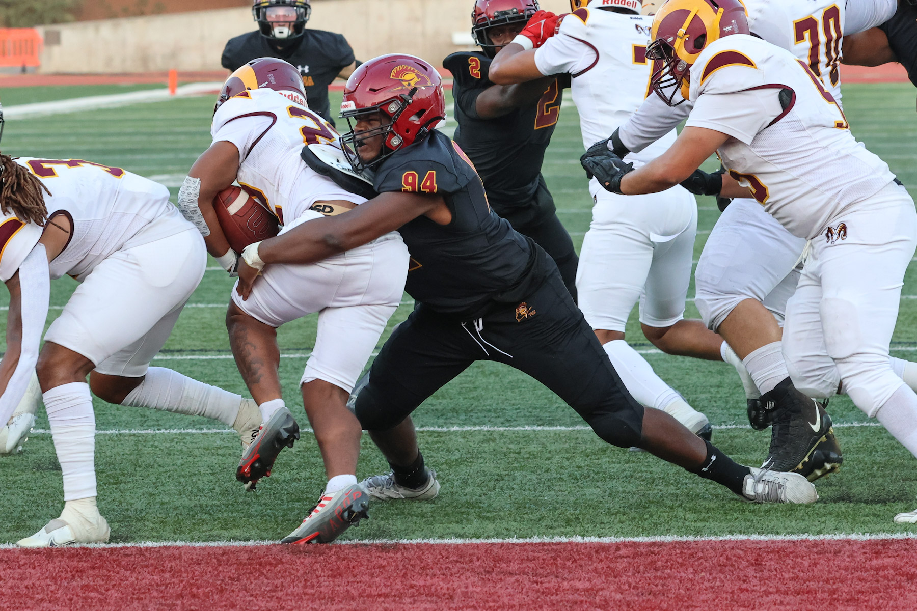 Julius Ray makes one of his 11 tackles during PCC's win on Saturday night (photo by Richard Quinton)