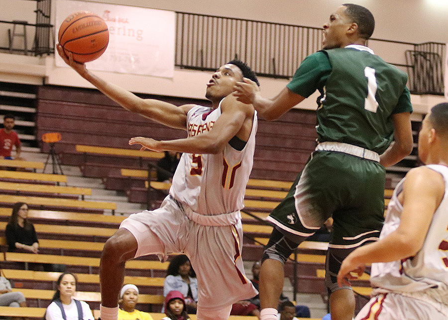 Malik Black drives to the hoop v. East Los Angeles Friday night at PCC, photo by Richard Quinton.