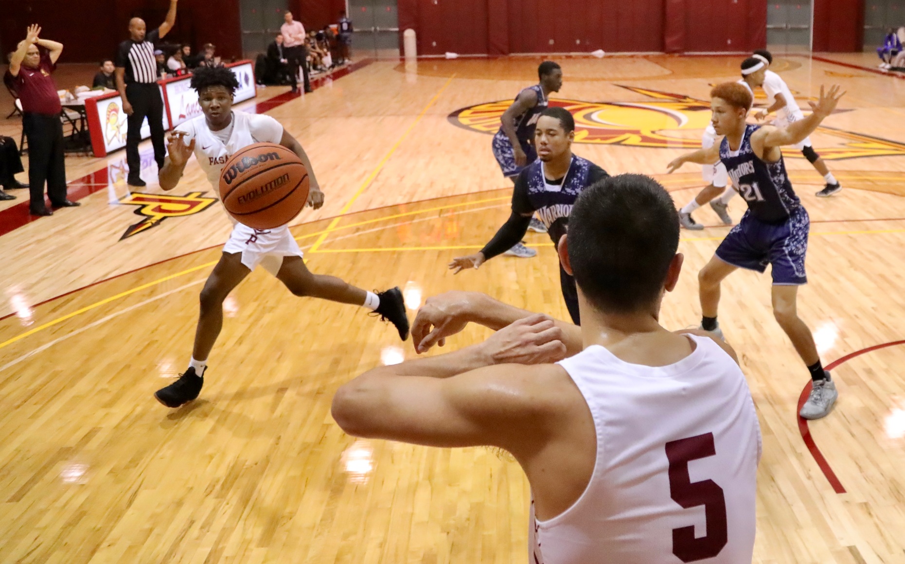 Patric Panoosi fires a pass to Lafayette Sanders during PCC's win over El Camino Wednesday night, photo by Michael Watkins.