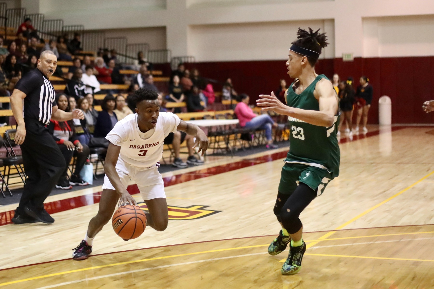 Lancer Rasheet Wilson drives toward the hoop during PCC's game v. East Los Angeles Friday, photo by Michael Watkins.