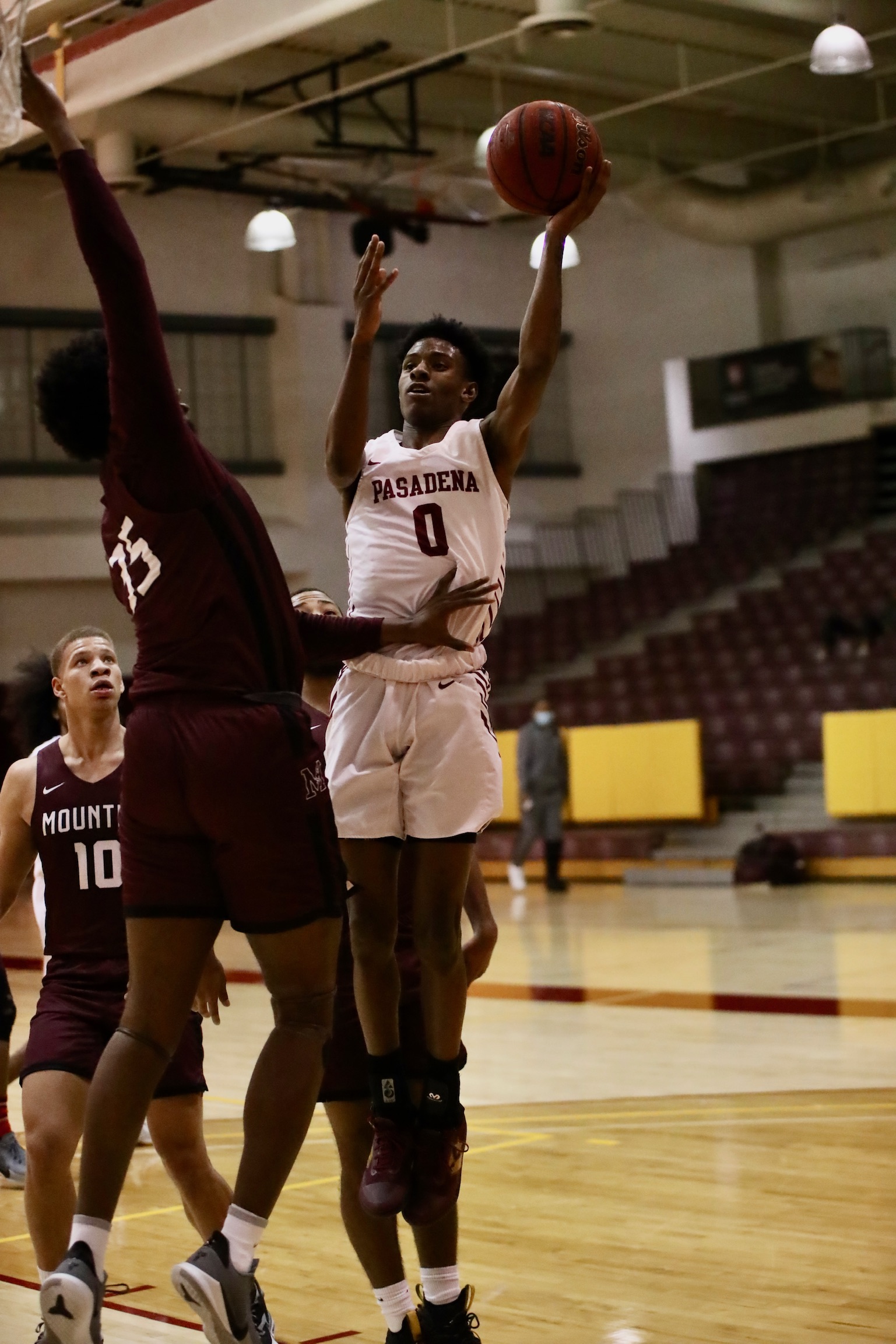 Jordan Flowers goes up for the jumper in Friday's home game (photo by Michael Watkins, Athletics).