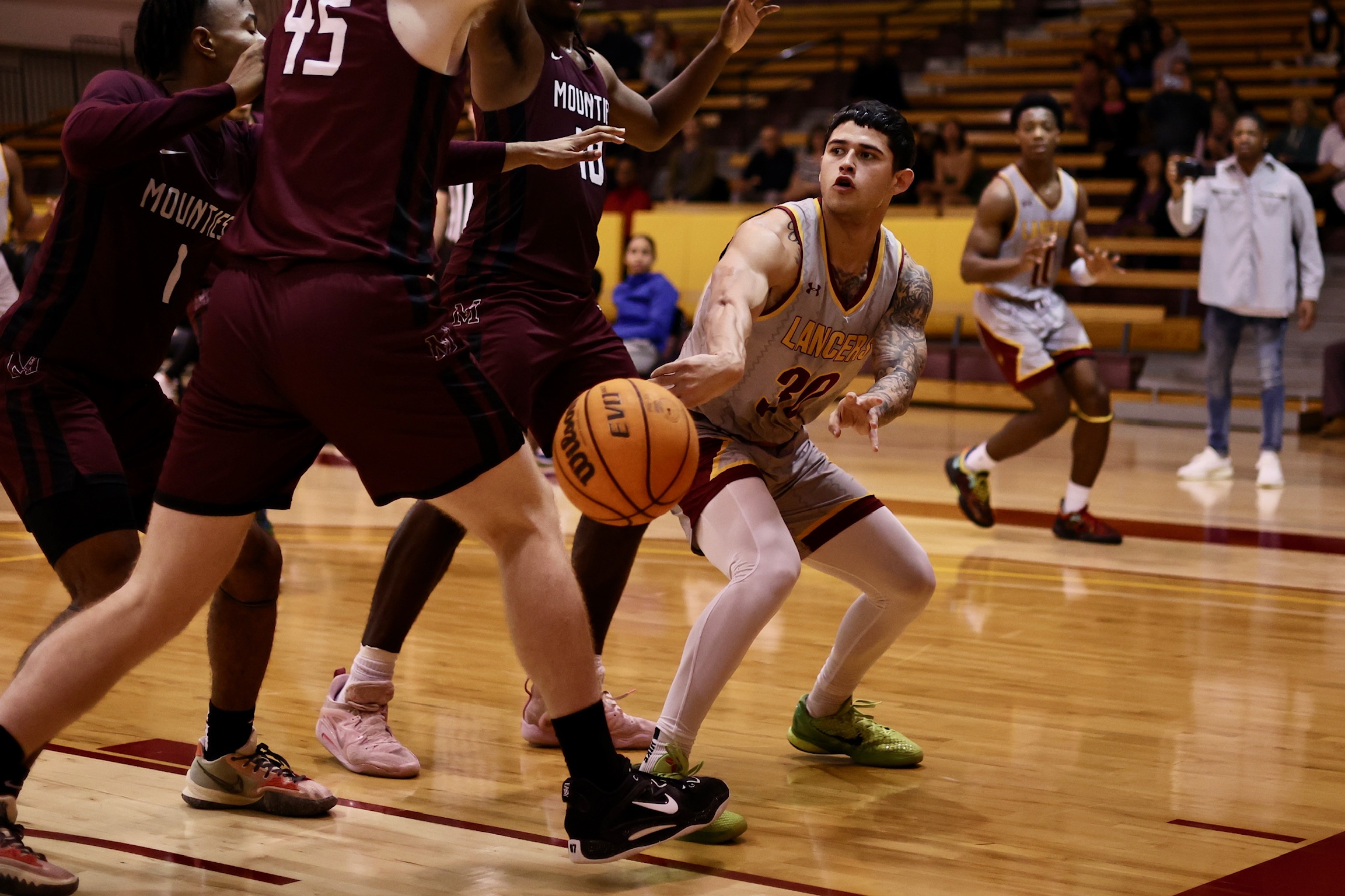 Caleb Gerber with the pass during PCC's win over Mt. San Antonio on Friday night (photo by Michael Watkins).