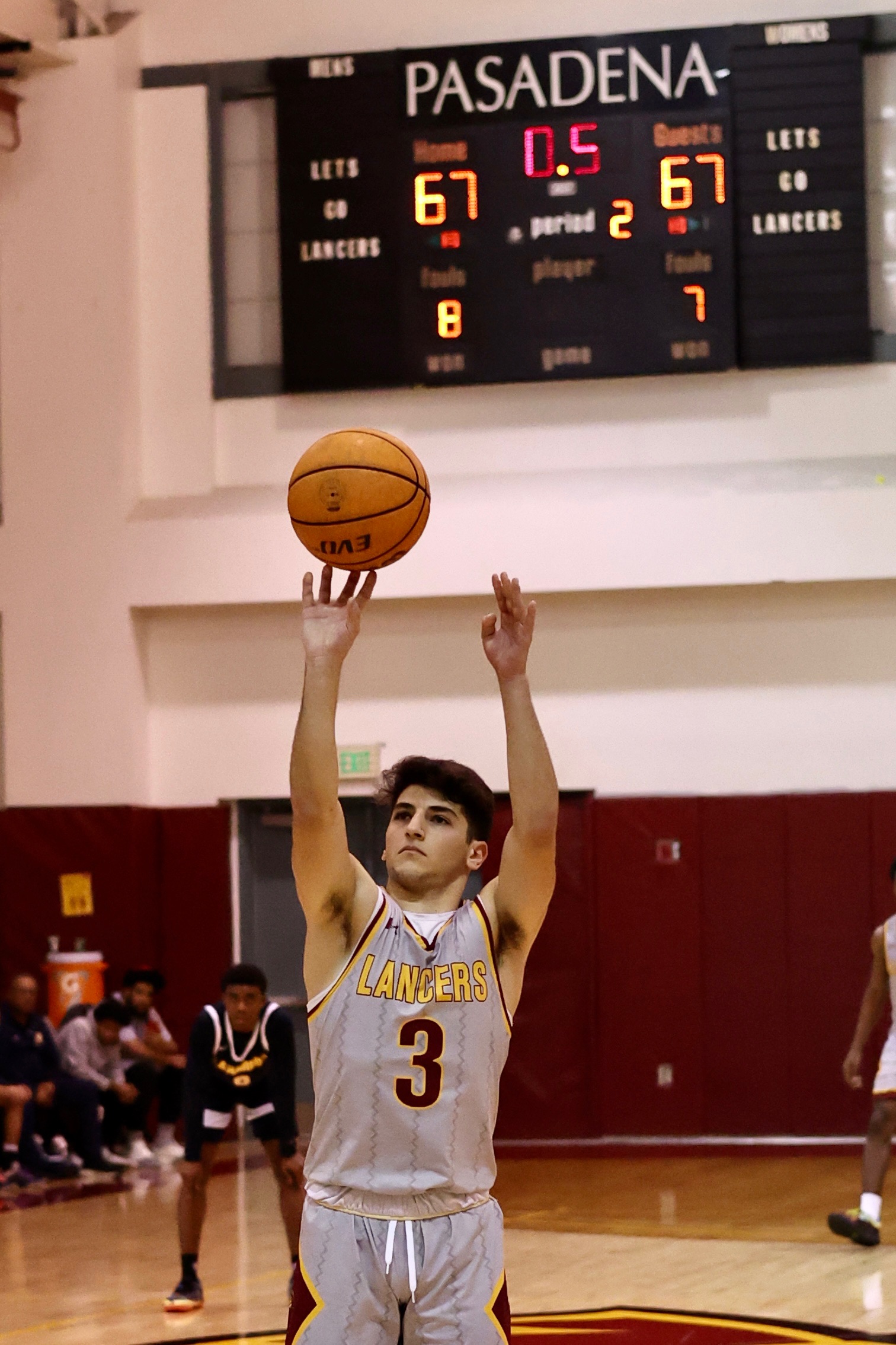 Shant Chenorhavorian sinks the winning free throw in Friday's upset win (photo by Michael Watkins).