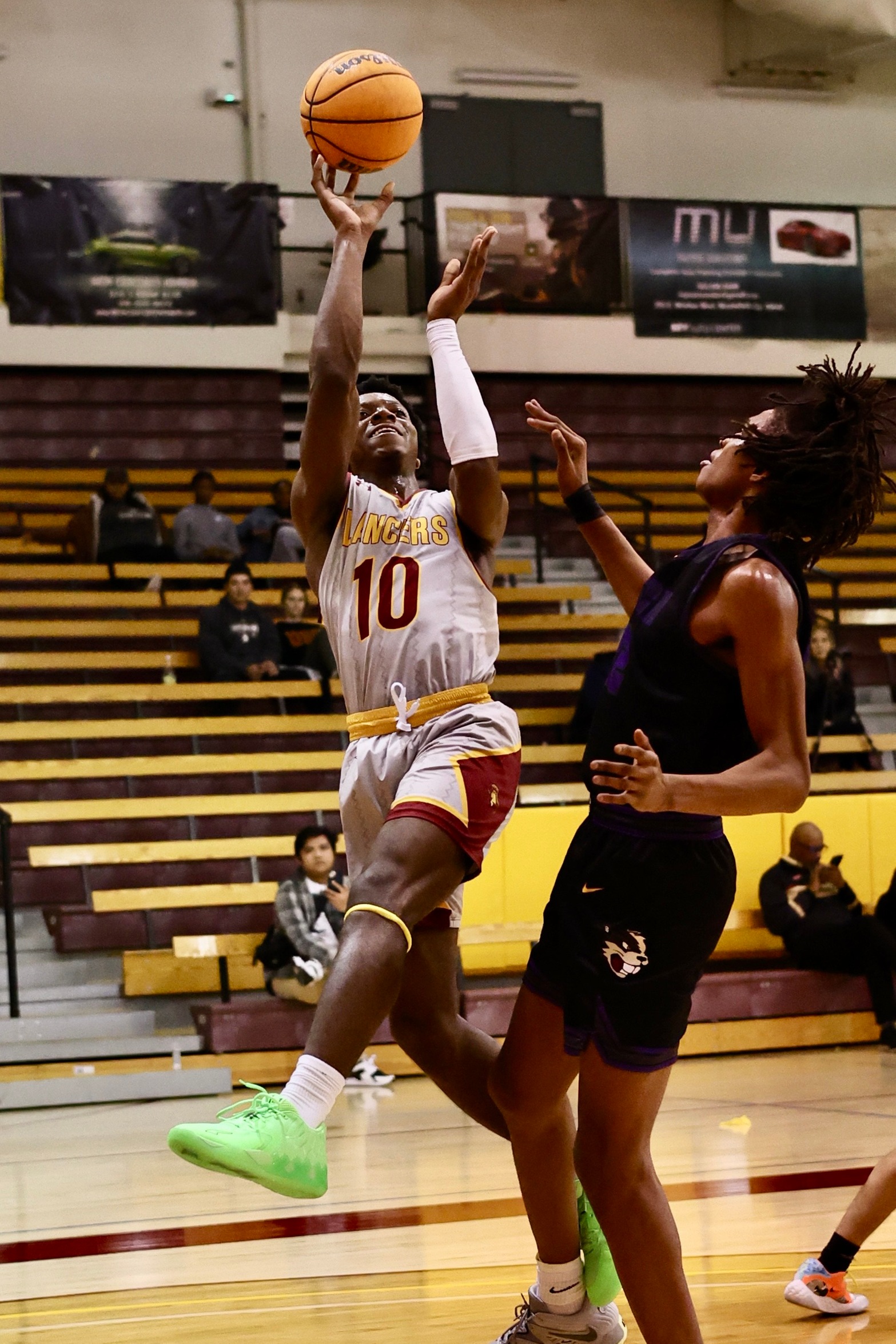Jonathan Tchengang puts up the jumper during PCC's win on Friday night (photo by Michael Watkins).