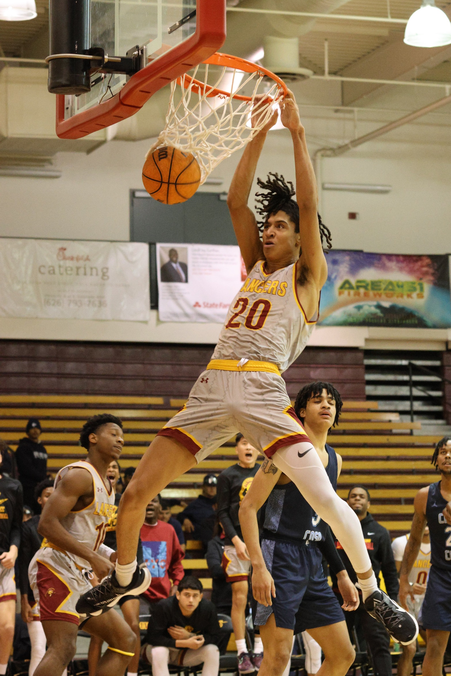 Nigel Wilson with the dunk v. Cerro Coso in a Wednesday's regional playoff victory (photo by Richard Quinton).
