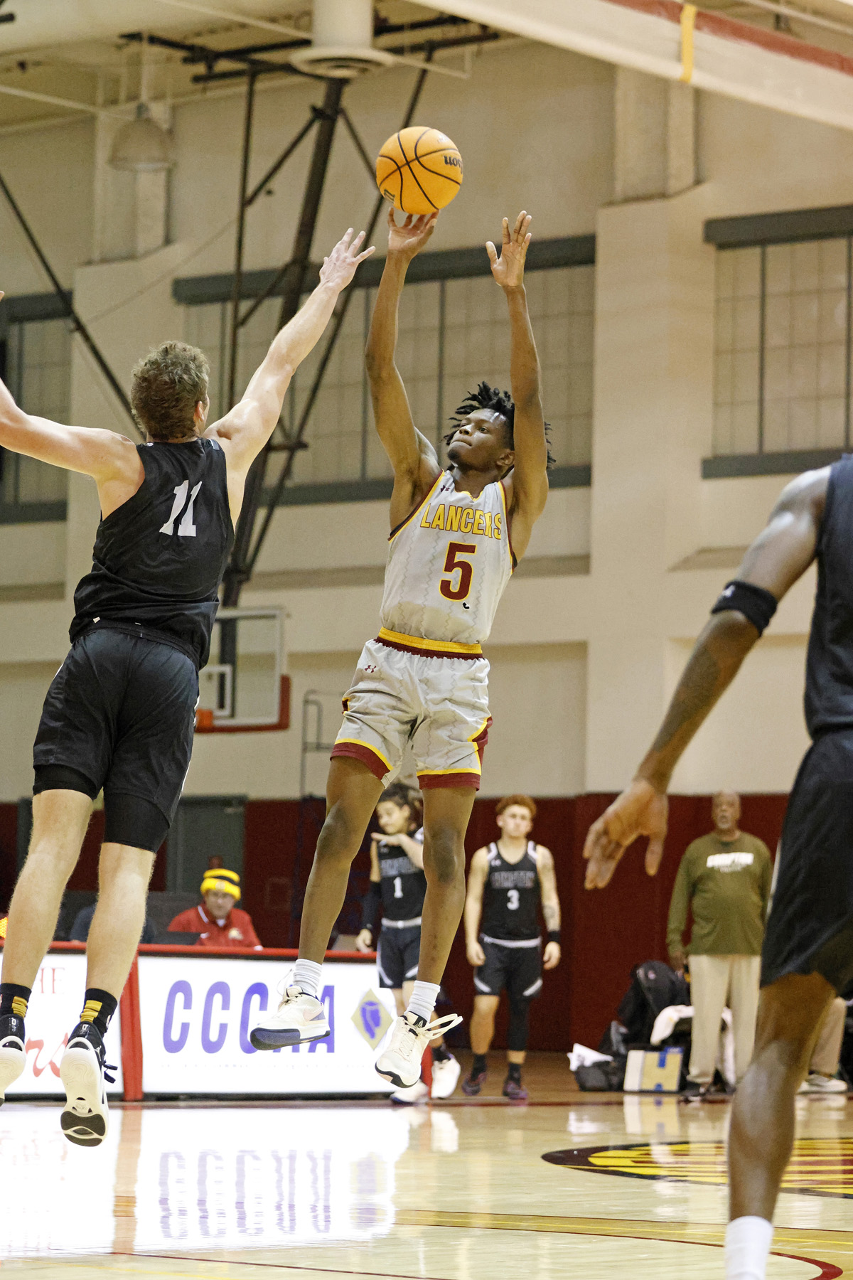 Myles Watkins shoots the jumper during PCC's win on Friday (photo by Richard Quinton).