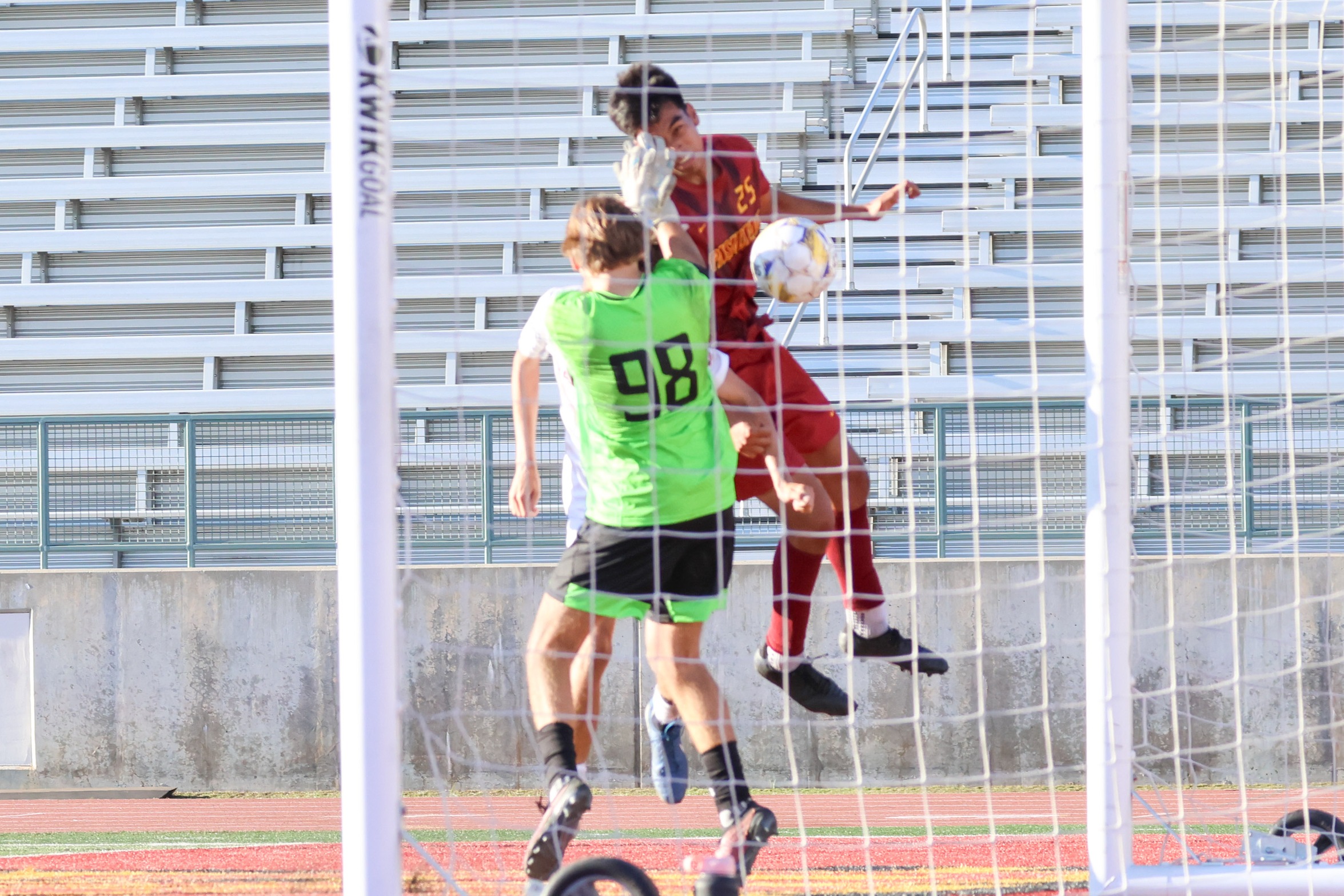 Josiah Lucio heads in the tying goal on Friday (photo by Richard Quinton).