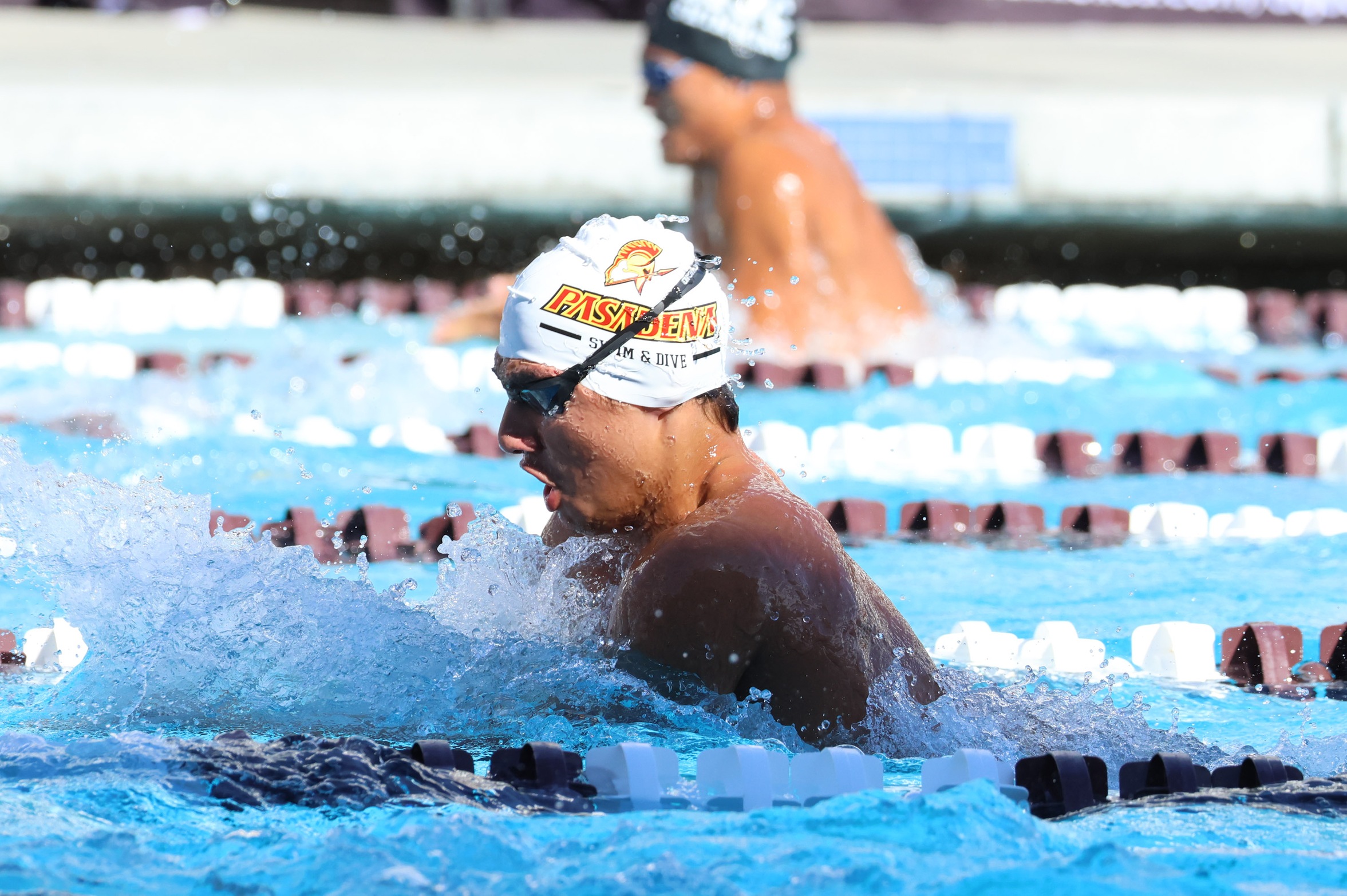 De'Andre Paiz in action for the Lancers men's swim team (photo by Richard Quinton).
