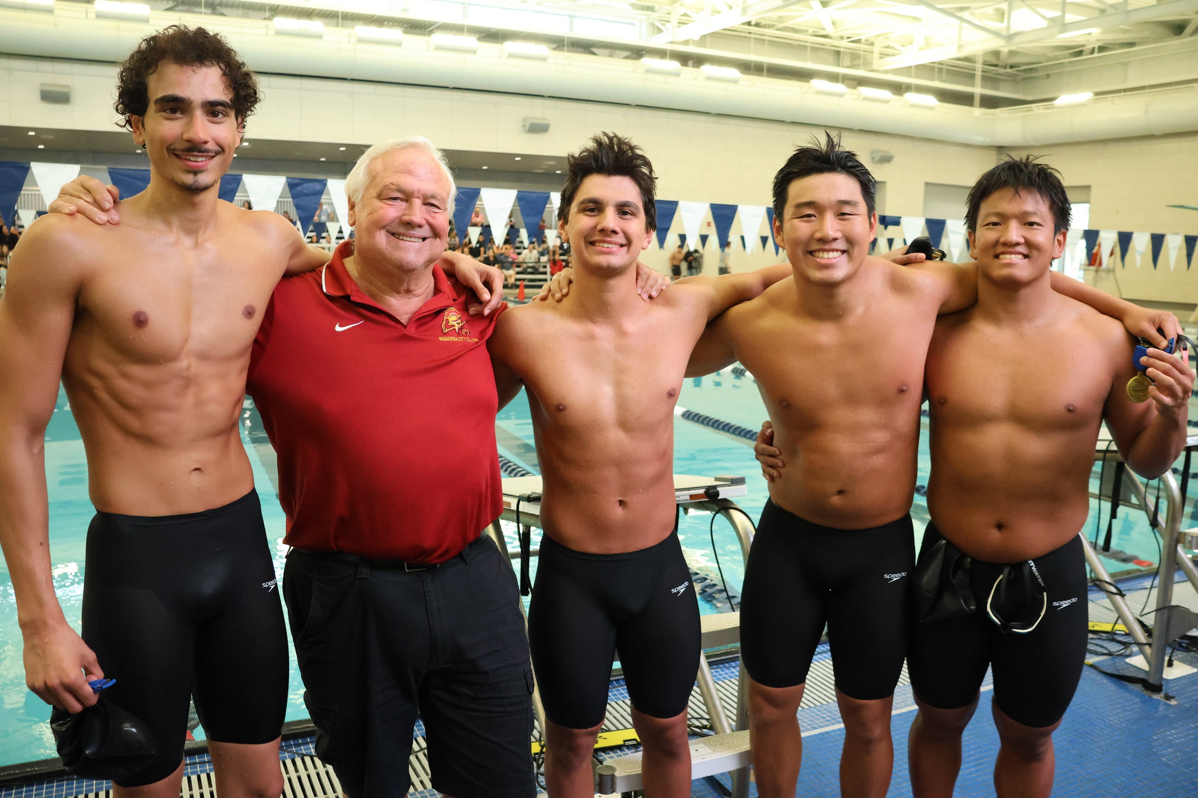 The Lancers 200 medley relay winning SCC squad with Coach Terry Stoddard (photo by Richard Quinton).