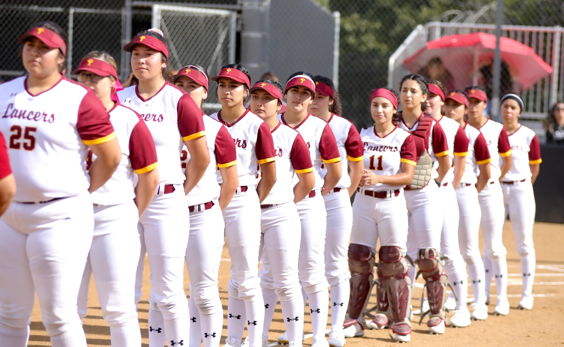 The 2020 PCC Lancers line up during the introductions on opening day Friday at Robinson Park.