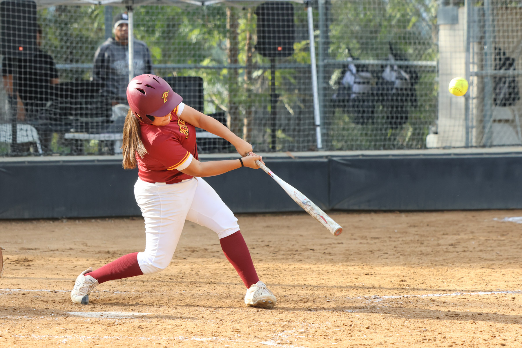 Genesis Ramirez with the game-winning RBI double in Monday's win at Rio Hondo (photo by Richard Quinton).