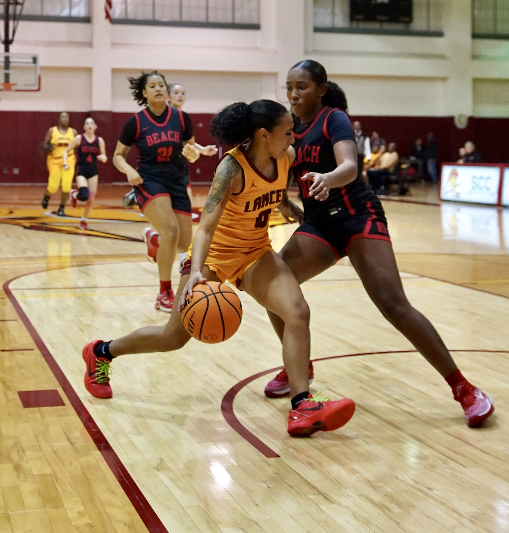 Vanessa Epperson is defended by LBCC's Brillana Boyd during Friday night's loss (photo courtesy of Steve Solis).
