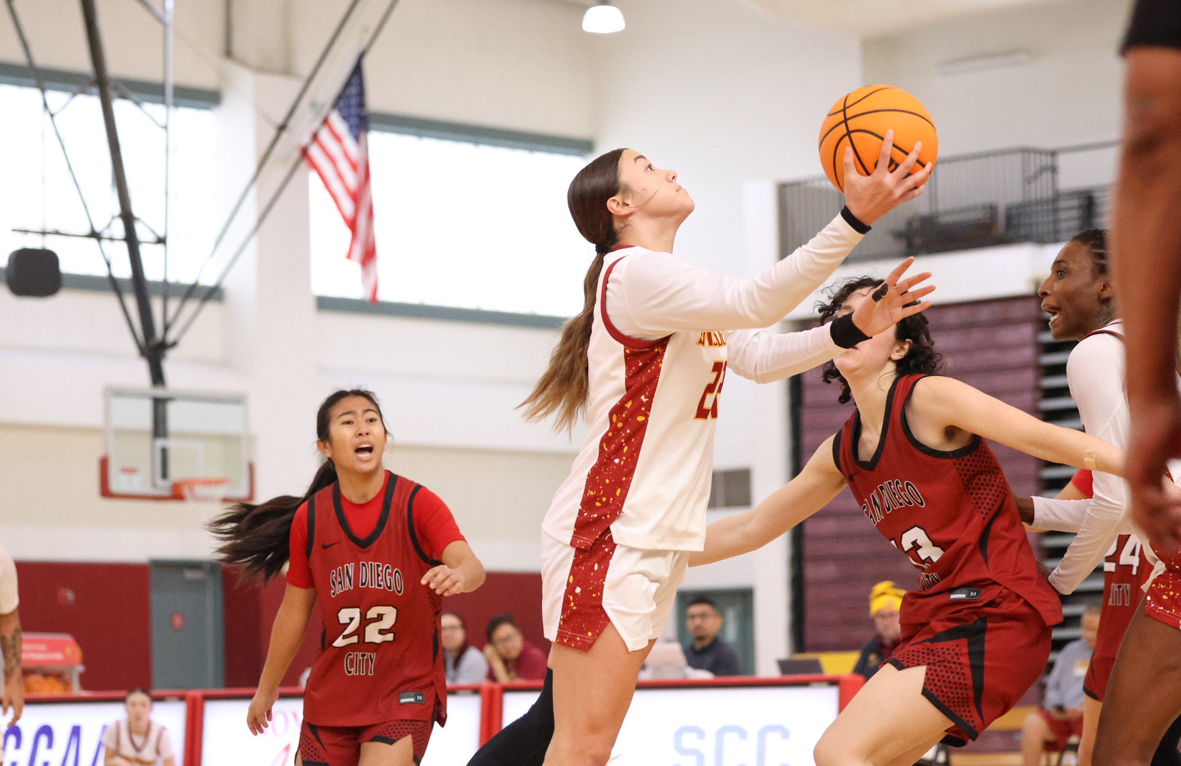 Kamora Fletcher goes to hoop during PCC's win on Saturday (photo/gallery by Richard Quinton).