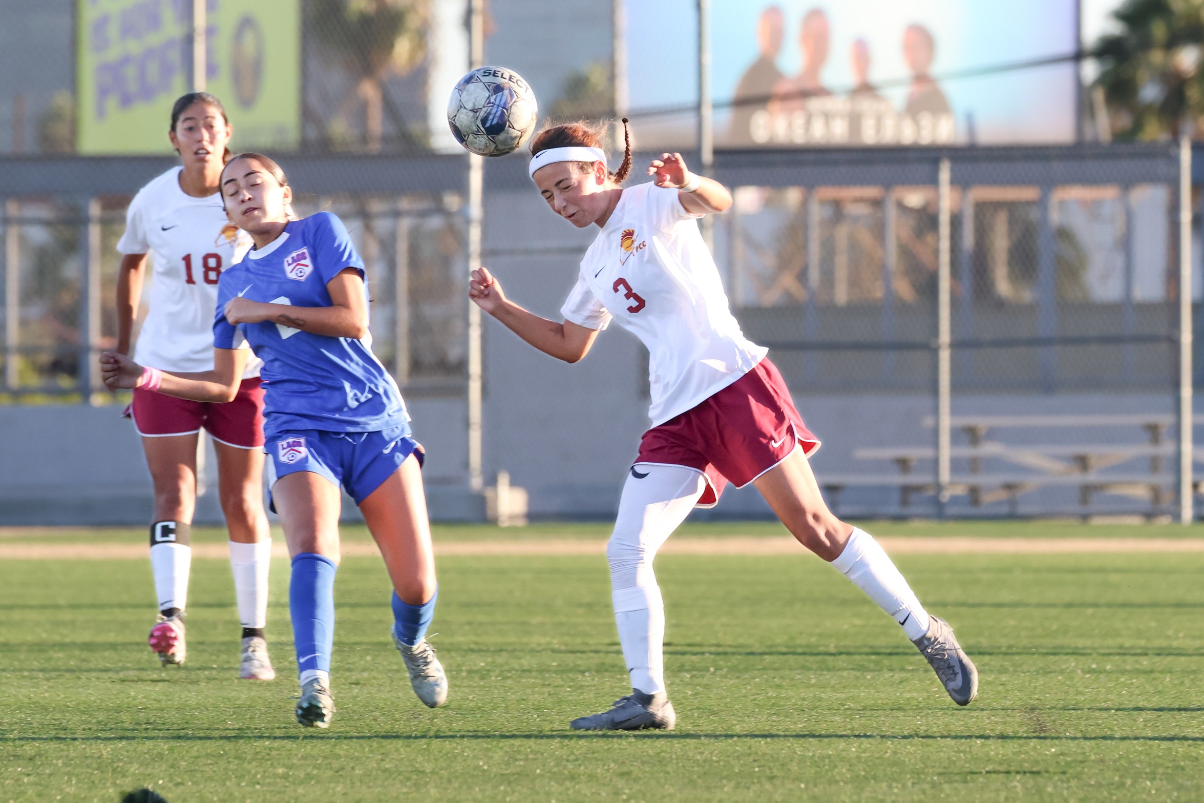 Tatiana Grigoryan with the header in Tuesday's win at LA City (photo by Richard Quinton).