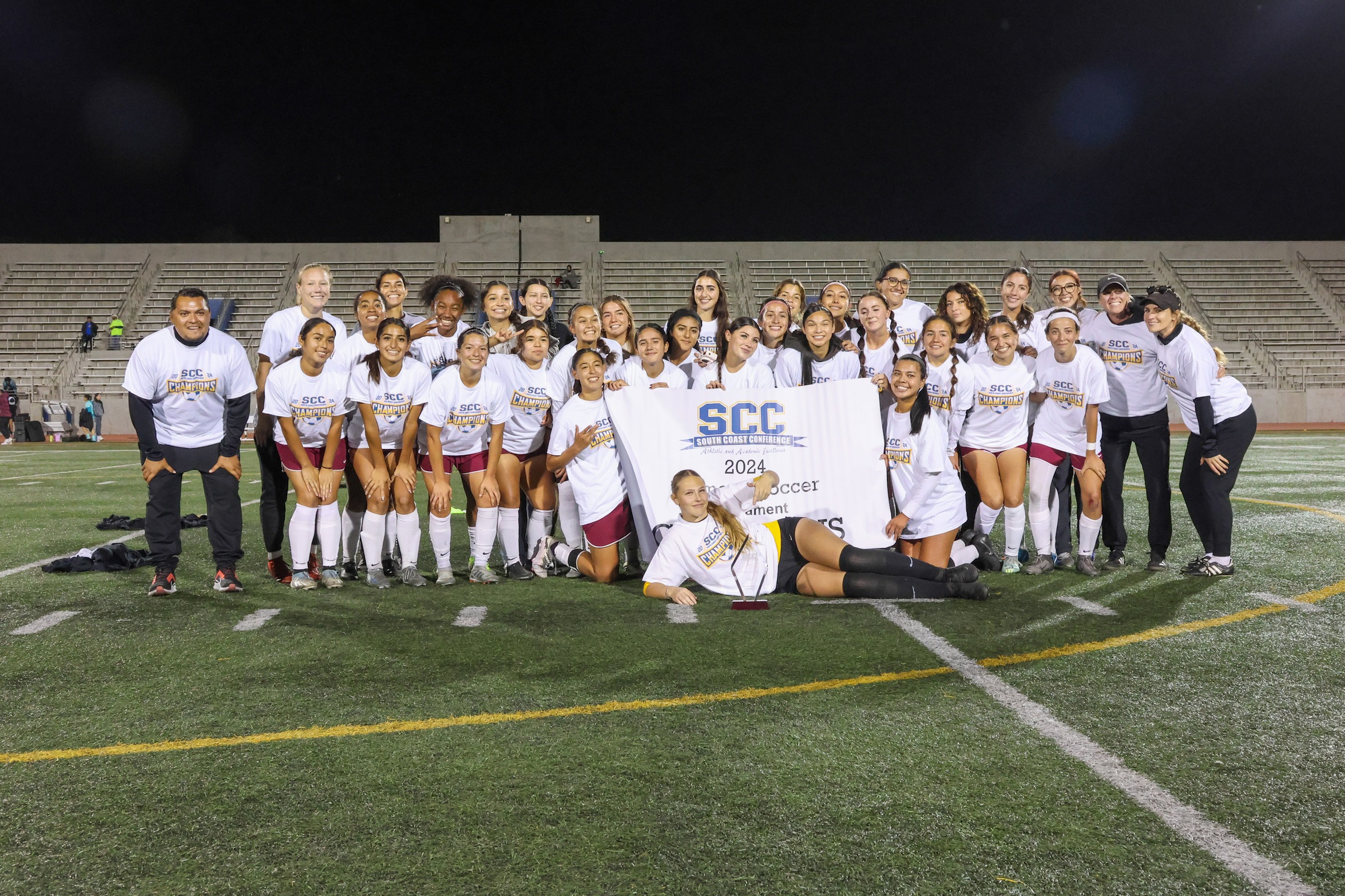 The Lancers celebrated winning the SCC Tournament title at El Camino College on Thursday night (photo by Richard Quinton).