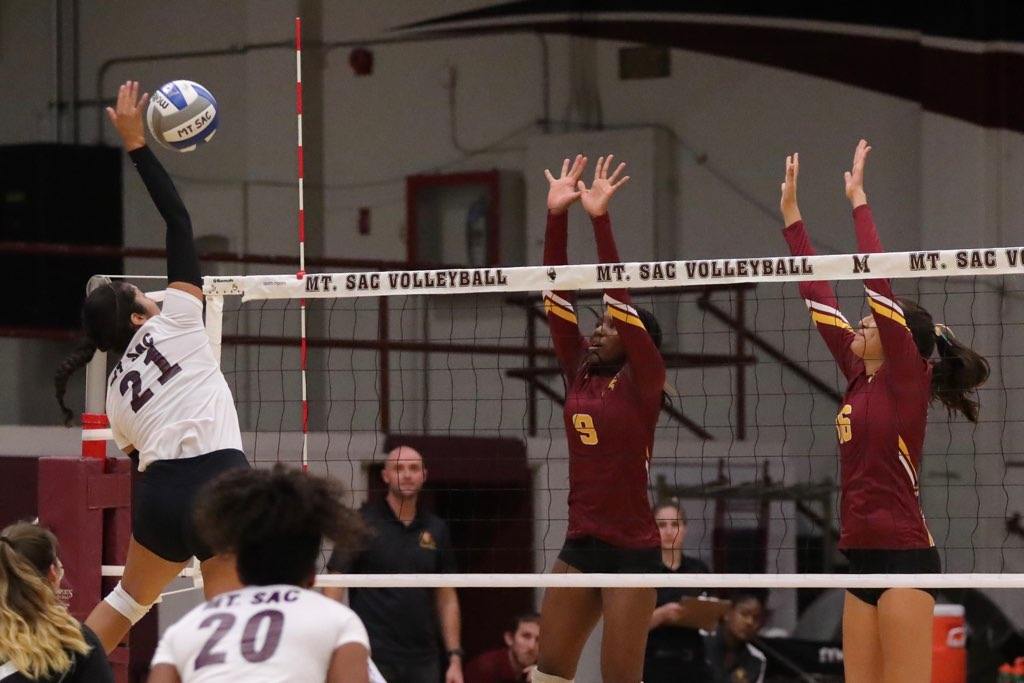 Lancers Erykah Wilson and Paulina Lopez defend the net in their 4-set win at Mt. San Antonio College Friday, photo by Michael Watkins.
