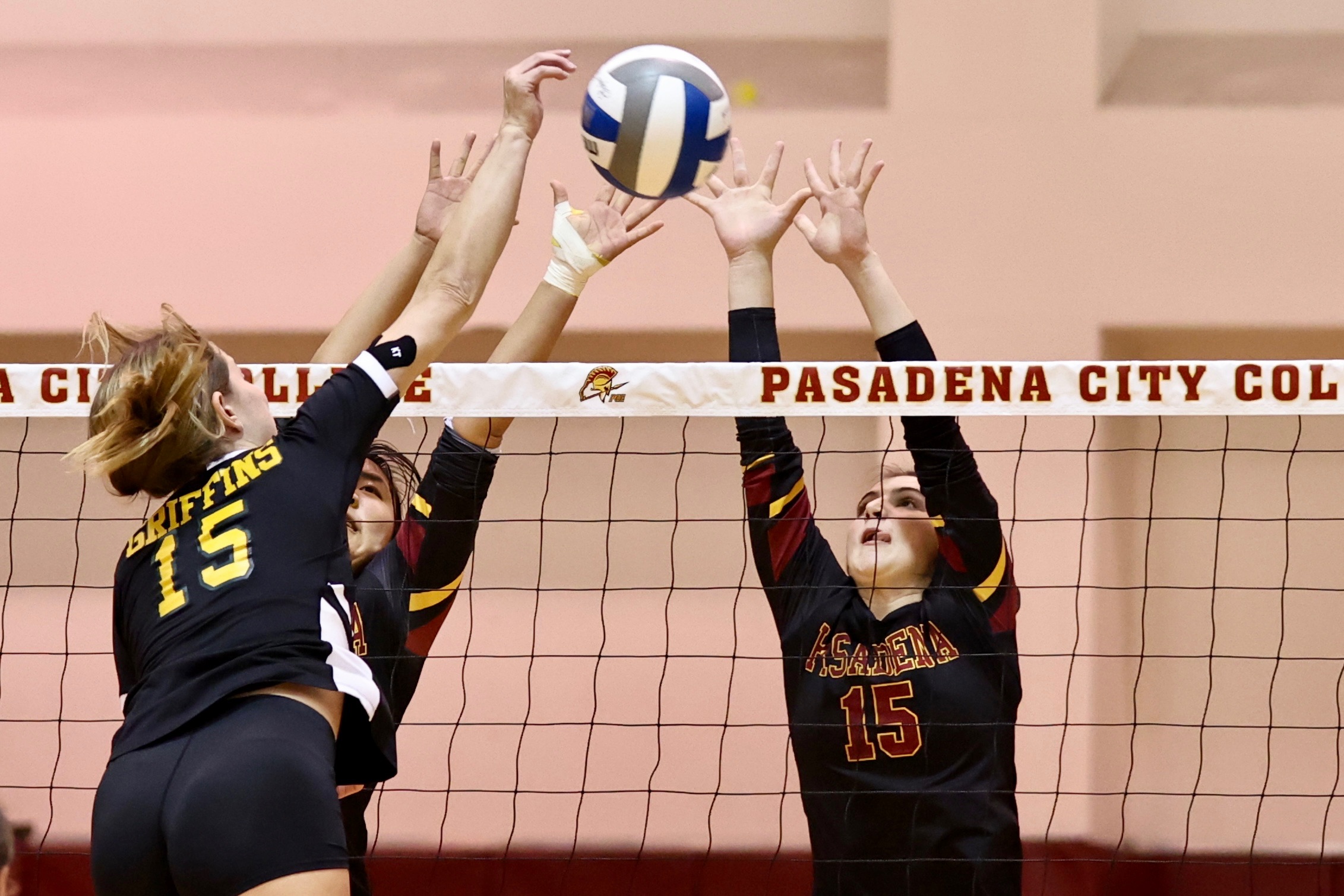 Lancer Reese Roper goes up to block Grossmont All-American Madi Bogle during Tuesday's playoff thriller (photo by Michael Watkins).