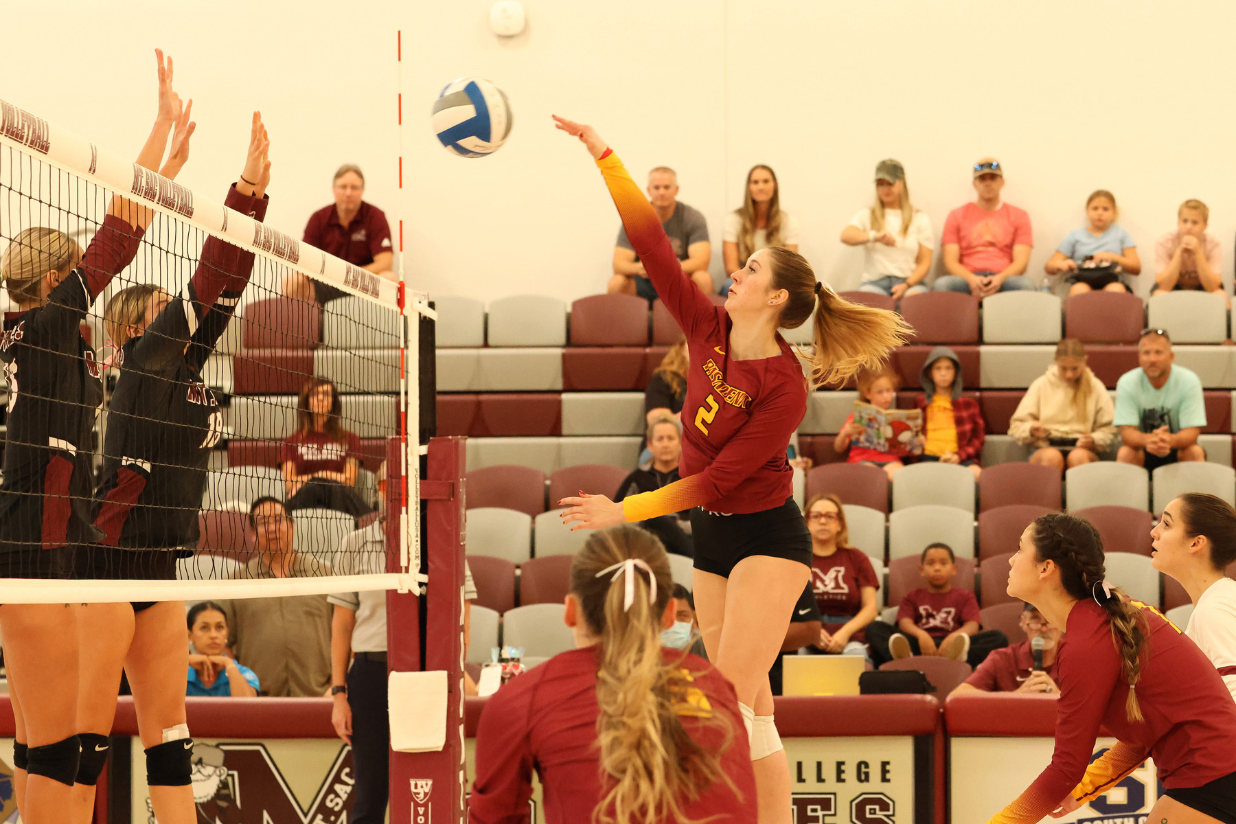 Katie Carius drives an attempt during PCC's loss at Mt. San Antonio.  She had 22 kills v. Long Beach (photo by Richard Quinton).