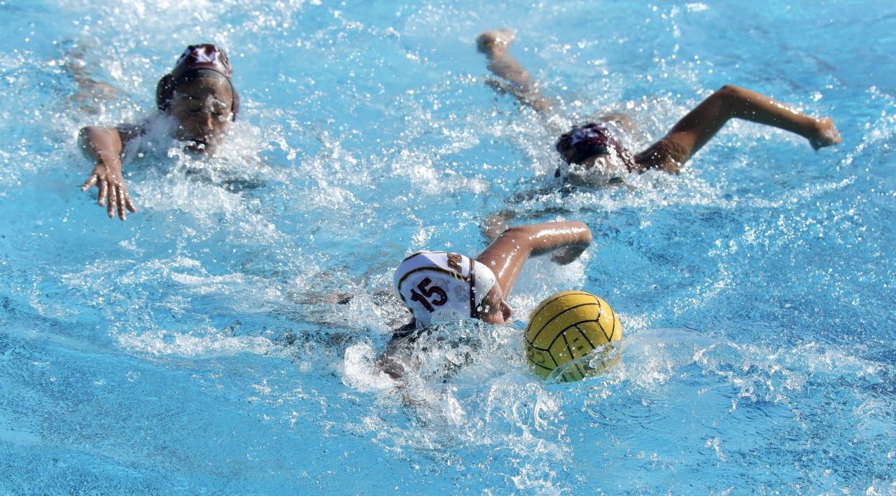 Fernanda Alvarez is being chased by two Mt. San Antonio players during the Lancers road loss on Wednesday, photo by Michael Watkins.