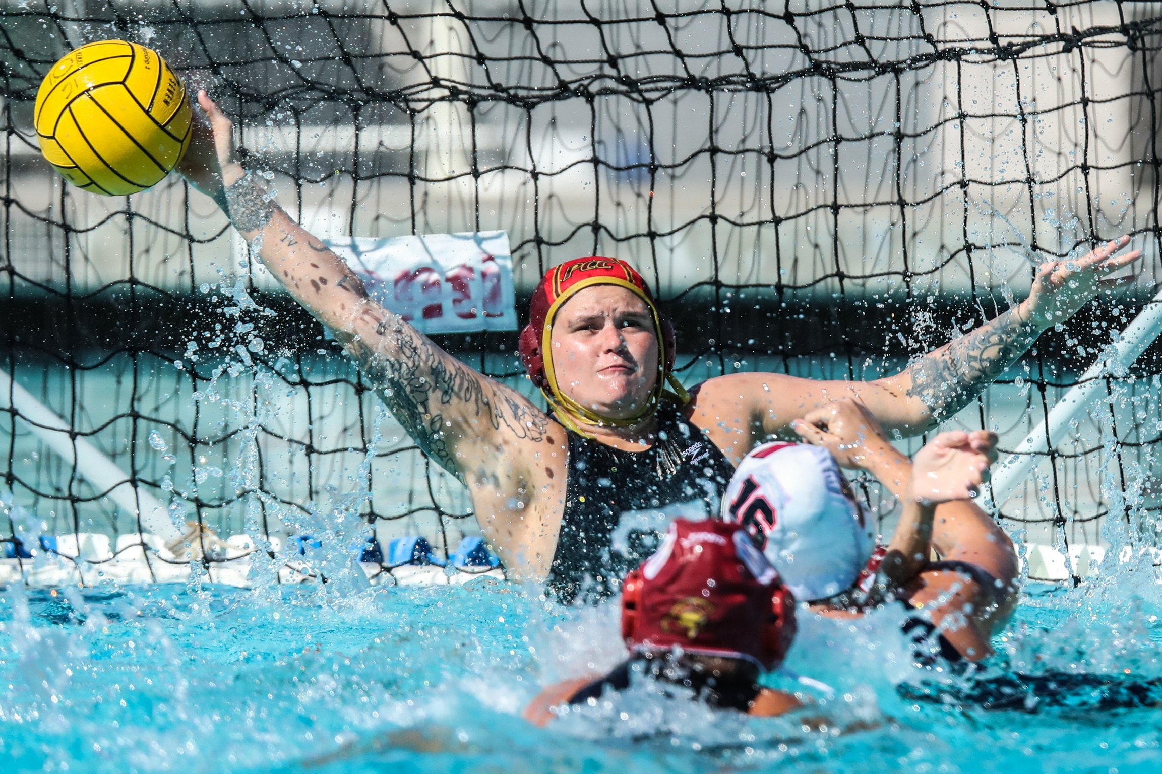 Dani Dockendorf-Cani makes a save in a recent match (photo by Michael Watkins).